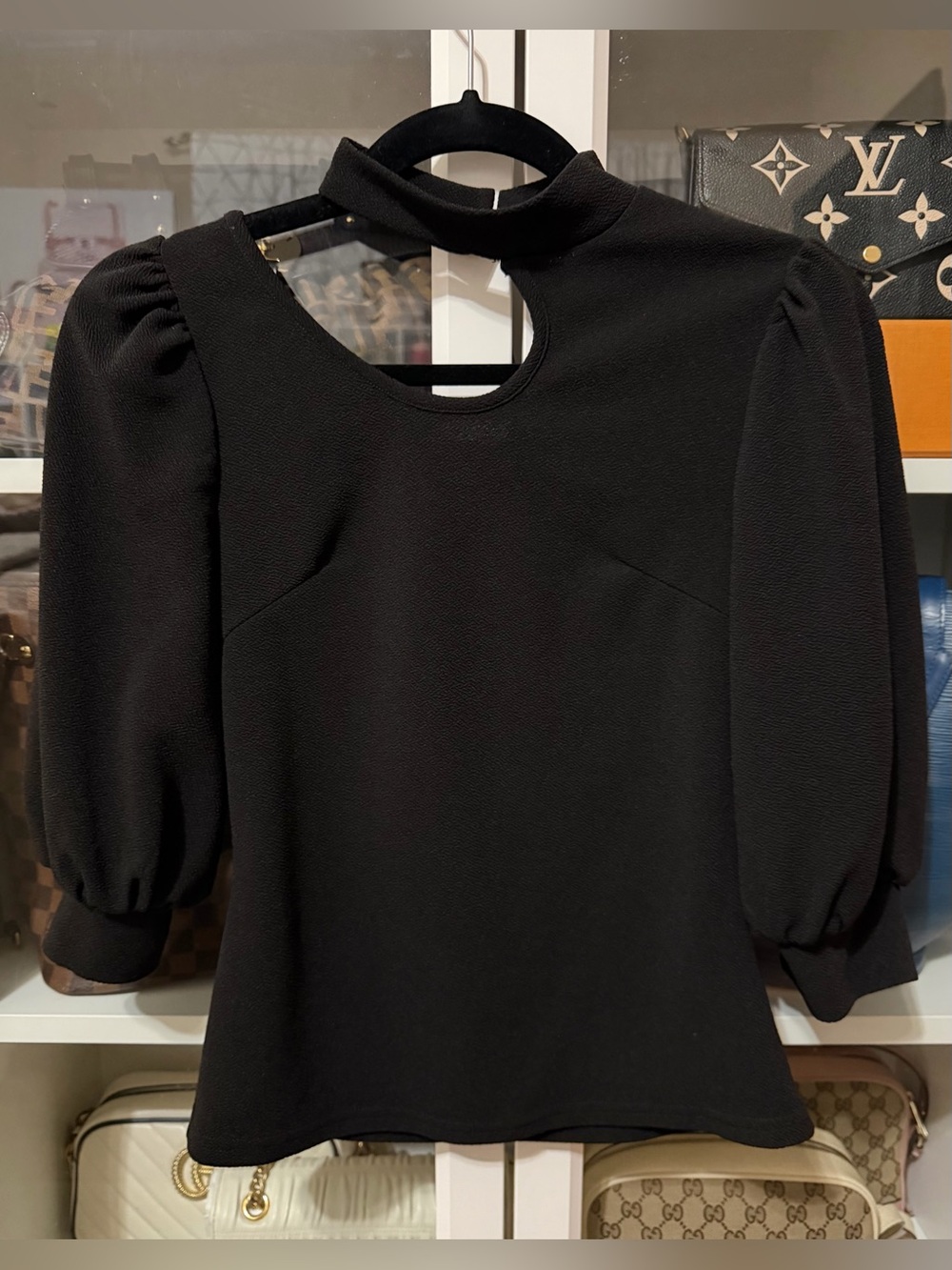 Black Puff-Sleeve Cutout Blouse with Mock Neck